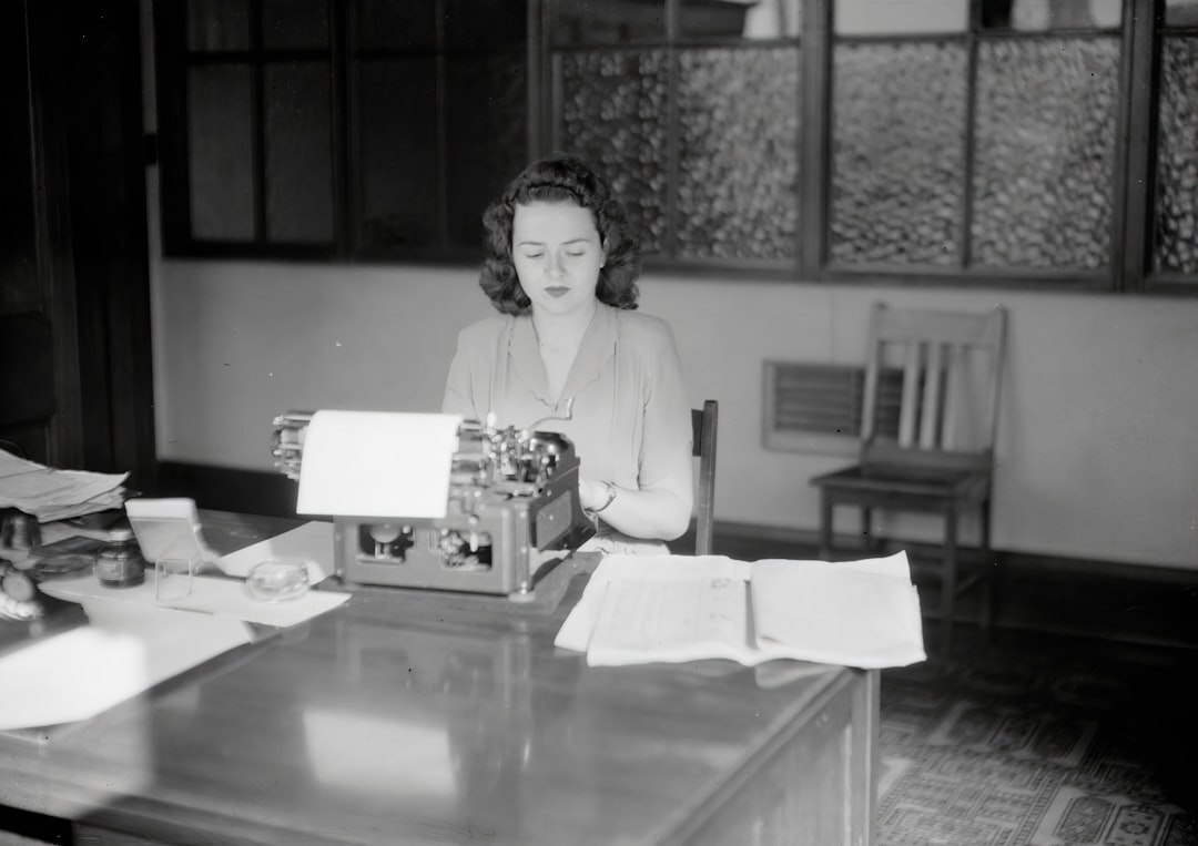 Journalist writing news script at desk